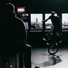 Matt Wilhelm, professional BMX rider, doing stunts in front of an LED wall while a Cinematographer films it